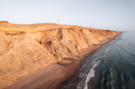 Photo for Aerial Drone Photo at Rubjerg Knude Lighthouse during sunset, Denmark Coastline. High quality photo - Royalty Free Image
