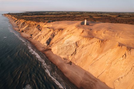 Photo for Aerial Drone Photo at Rubjerg Knude Lighthouse during sunset, Denmark Coastline. High quality photo - Royalty Free Image