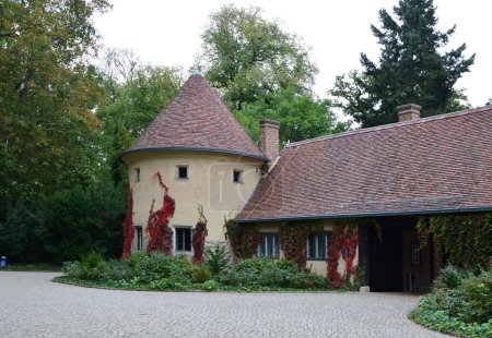 Historical Castle Cecilienhof in Autumn in the Park Neuer Garten in Potsdam, the Capital of Brandenburg