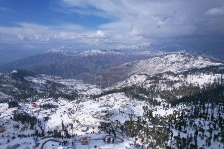 Aerial View of Malam Jabba Hill station and town in the Middle of Himalayan Mountains, covered in snow during winter, Swat Khyber Pakhtunkhwa Pakistan