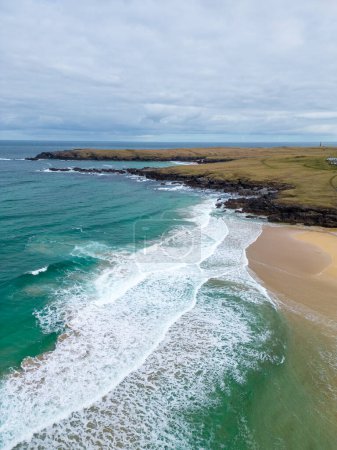 Eoropie, Isle of Lewis, UK. UK Weather: Aerial view of Eoropie Beach on the North West coast of the Isle of Lewis, Scotland. Bright and sunny with calm winds. Credit: Bradley Taylor / Alamy News