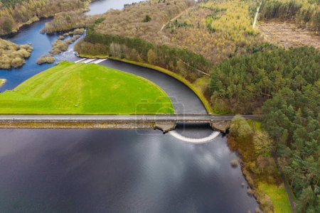 Aerial drone view of Fewston Reservoir dam feeding into Swinsty Reservoir. Part of Yorkshire Water reservoir supply of drinking water.