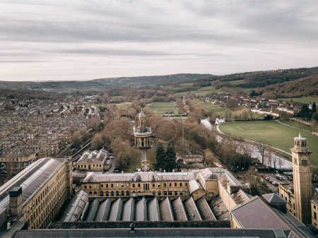 Drone view over Salts Mill, Saltaire, an old Victorian textile mill in Bradford, West Yorkshire, renovated for use as art gallery.