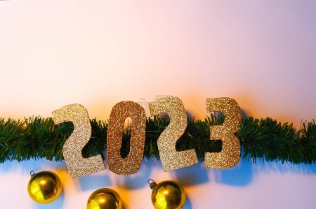 Photo for A Happy New Year 2023. Golden numbers Christmas white background - Royalty Free Image