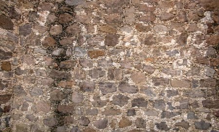 Hintergrund einer alten Mauer aus Felsen in Mexiko, mit Platz für Text