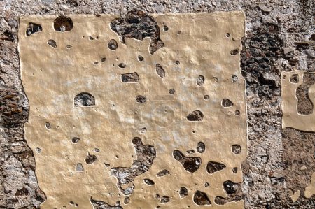 A Old wall texture with broken plaster and space for text