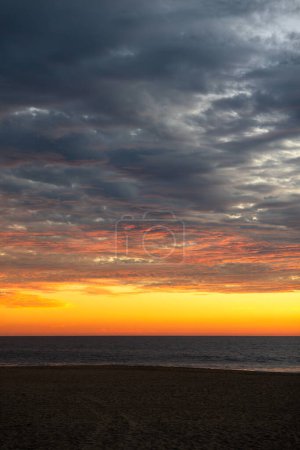 A Sunset background at Ixtapa Zihuatanejo beach, Mexico, with space for text