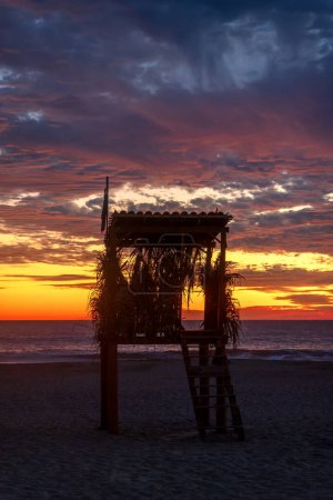 A Lifeguard rest area on the beach during beautiful sunset