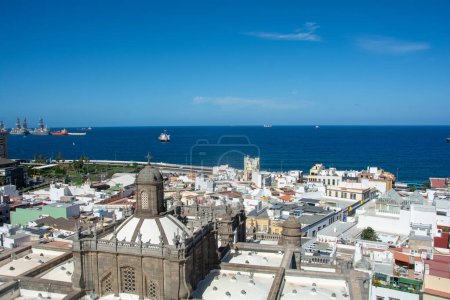 Photo for Panoramic view from above of the capital Las Palmas Gran Canaria in Spain with part of the Santa Ana Cathedral and views to the harbor and the sea - Royalty Free Image