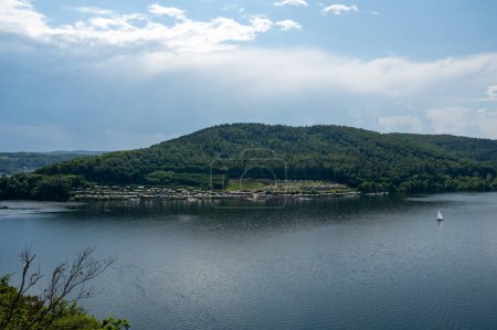 View of the Lake Eder with a campsite, sky and clouds, Hesse, Germany