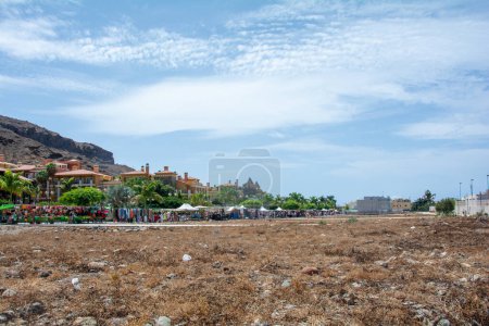 Large Friday market in the streets of the Spanish town of Puerto de Mogan, on the Canary Island of Gran Canaria in Spain