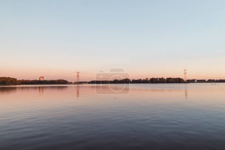 Photo for Colorful water surface and sky during sunset in summer in Almere, Netherlands. - Royalty Free Image