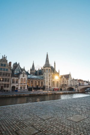 Ghent promenade called the Graslei and the charming historic houses at sunrise. The centre of the Belgian city. Flanders.
