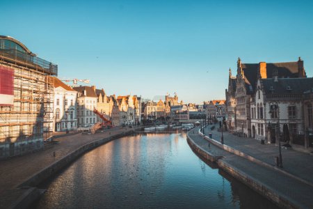 Ghent waterfront called the Graslei and the charming historic houses at sunrise. The centre of the Belgian city. Flanders.
