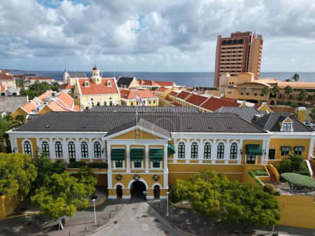 Photo for Downtown Willemsted historic city street colourful buildings with pastel-colored colonial architecture. High Quality Photo. - Royalty Free Image