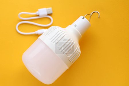 Rechargeable Light Bulb, yellow background