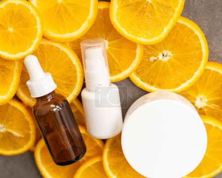 facial serum, facial cleanser and cream with vitamin C, package