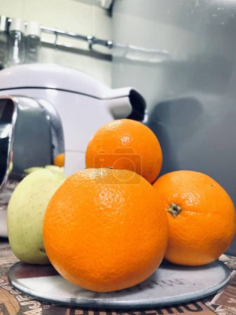 Photo for Kitchen, vitamins, orange, apple, interior, healthy food and health - Royalty Free Image