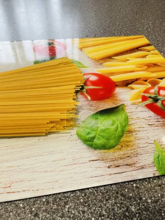 Photo for Pasta, noodles, spaghetti, flour, flour, cooking, kitchen, food, cook, delicious, benefit, health, vegan, veganism, table, board - Royalty Free Image