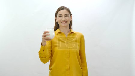 Photo for Character portrait of a healthy young woman who loves milk. Woman stating that she is healthy by drinking milk. Isolated on white background. - Royalty Free Image