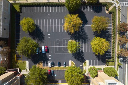Photo for Aerial view of many colorful cars parked on parking lot on apartment building backyard. Place for vehicles in front of residential condo. - Royalty Free Image