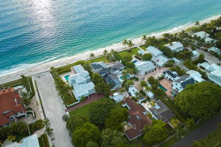 Aerial view of expensive residential houses in island small town Boca Grande on Gasparilla Island in southwest Florida. American dream homes as example of real estate development in US suburbs.
