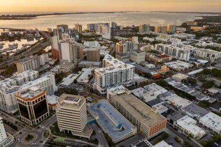 Photo for Sarasota, Florida city architecture at sunset. High-rise office buildings in downtown district. Real estate development in Florida. USA travel destination. - Royalty Free Image