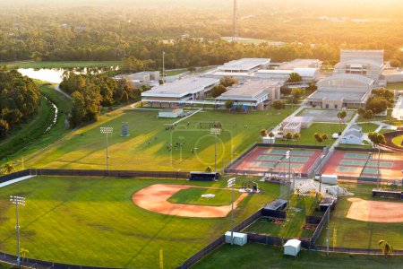 Public high school sports facilities in Florida. American football stadium, tennis courts and baseball diamond sport infrastructure.