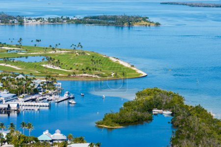 Large golf course and sports grounds with green grass in Boca Grande, small town on Gasparilla Island in southwest Florida.