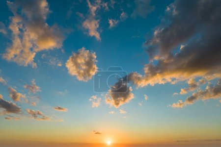 Photo for Sunset sky with bright colorful orange and yellow clouds. Panoramic skyscape. - Royalty Free Image