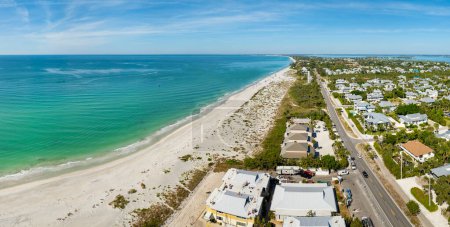 American waterfront houses in rural US suburbs. View from above of large residential homes in island small town Boca Grande on Gasparilla Island in southwest Florida.
