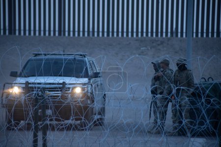 Photo for The Texas National Guard monitors the border between Mexico and the United States to prevent migrants from entering the country irregularly to seek asylum. - Royalty Free Image