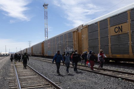 Photo for Hundreds of Migrants Travel on 'La Bestia' Freight Train to Reach the U.S. Border with the Intention of Seeking Humanitarian Asylum - Royalty Free Image