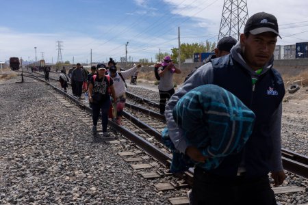 Photo for Hundreds of Migrants Travel on 'La Bestia' Freight Train to Reach the U.S. Border with the Intention of Seeking Humanitarian Asylum - Royalty Free Image