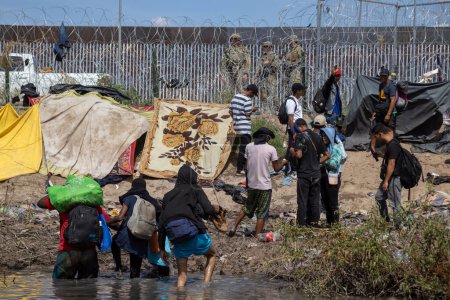 Photo for Migrants Crossing the Mexico-U.S. Border at Rio Bravo to Seek Humanitarian Asylum, Juarez, Chihuahua, Mexico, 02102023. - Royalty Free Image