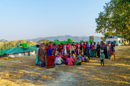Photo for Kahila Holi Celebrating Sisterhood in the Mountains of Uttarakhand.Exploring the Rich Traditions of Baithaki Holi Amidst Ranikhet's Serene Landscapes at Ranikhet, Nanital India December, 2023 - Royalty Free Image
