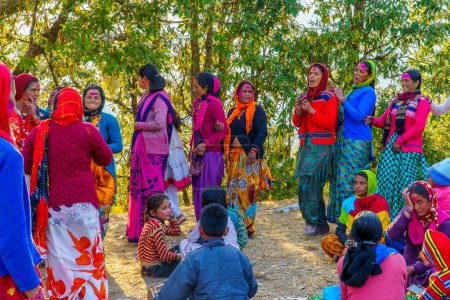 Photo for Kahila Holi Celebrating Sisterhood in the Mountains of Uttarakhand.Exploring the Rich Traditions of Baithaki Holi Amidst Ranikhet's Serene Landscapes at Mukhteshwar, Nanital India December, 2023 - Royalty Free Image