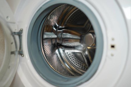 Photo for Washing machine's drum. Washing machine inside view of the drum. - Royalty Free Image