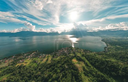 Photo for Aerial view of Kelok 44 natural tourist spot. Visitors can see the panorama of Maninjau Lake in Agam Regency, West Sumatra - Royalty Free Image