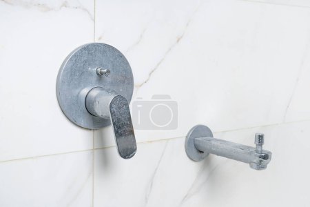 Photo for Dirty shower tap, concealed faucet with limescale deposits - Royalty Free Image
