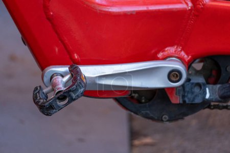 Photo for Detail of the pedal and bottom bracket of a shared rental red bicing - Royalty Free Image