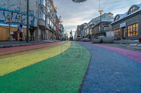 Photo for The Reykjavik gay pride rainbow from sklavrustgur street, between bergstaastrti and Laugavegur, one of the busiest streets leading to Hallgrimfrikja church. Once painted for Reykjavik Pride week, now permanent. - Royalty Free Image