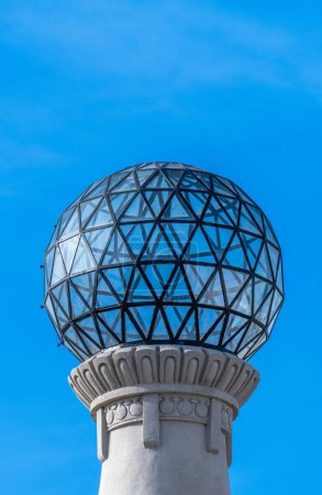 Photo for Transparent glass and metallic spherical dome of the highest part of a classic tower as if it were an astronomical observatory, microphone or a futuristic dome like Mad Max - Royalty Free Image