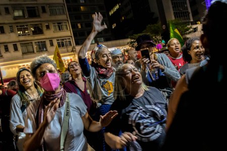 Photo for Sao Paulo, Brazil, January 09, 2023. Demonstrators perform an act in favor of democracy and protest against the terrorist followers of former president Jair Bolsonaro on Paulista Avenue - Royalty Free Image