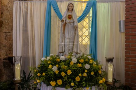 Statue of the image of Our Lady of Fatima, mother of God in the Catholic religion, Our Lady of the Rosary of Fatima, Virgin Mary on the altar in Brazil