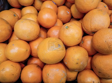Photo for Fresh sunkist oranges good for background - Royalty Free Image