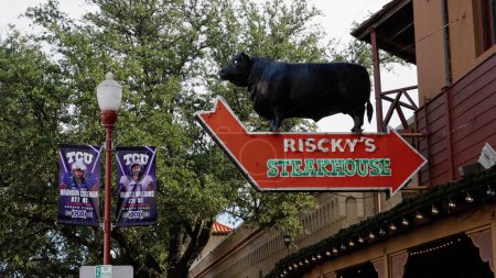 Photo for Risckys Steakhouse at Fort Worth Stockyards in the historic district - FORT WORTH, TEXAS - NOVEMBER 09, 2022 - Royalty Free Image