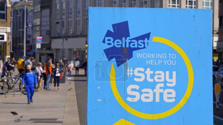 Photo for Stay safe sign in the city center of Belfast - BELFAST, UNITED KINGDOM - APRIL 25, 2022 - Royalty Free Image
