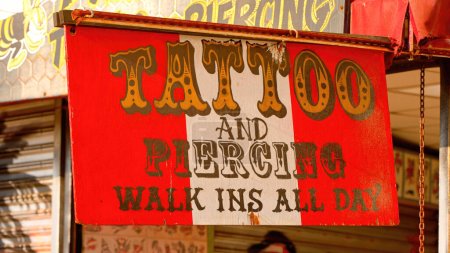Photo for Tattoo shop at Venice beach Ocean Front Walk - LOS ANGELES, USA - NOVEMBER 5. 2023 - Royalty Free Image