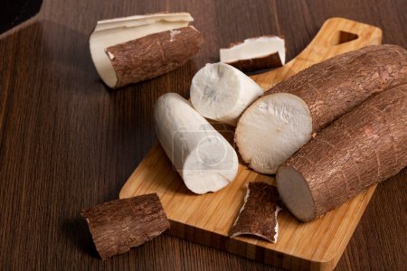 Photo for Fresh Organic Cassava Root - Manioc Esculenta; On White Background - Royalty Free Image